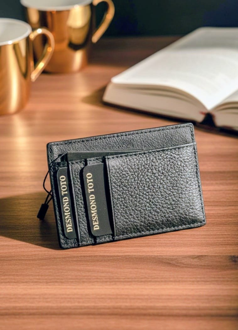 croc embossed front with pebbled black back with card slots give it a stunning look